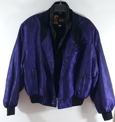 "90's Women's Ski Jacket Designer Purple Black Irridescent Quilted Posh Lux Satin Trim Snow Bomber Parka Coat by SKEA PARIS Vail Size 10 Fabulous warm designer jacket with all the bells and whistles...you'll be spoiled with this jacket! Gorgeous design embossed iridescent purple fabric with black satin trim and stretchy black trim on waist and cuffs. Baseball style bomber with shoulder pads for dramatic silhouette and extra puffy sleeves. Irridescent, cool black satin trim, front zipper, button Fitted Iridescent Outerwear For Fall, Fitted Iridescent Outerwear For Winter, Vintage Ski Jacket, Satin Jackets, Purple Satin, Vintage Ski, Parka Coat, Purple Fabric, Puffy Sleeves