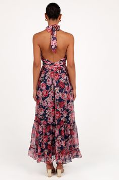 DETAILS   Its halter neck, complete with a stylish tie close, gives a flirty nod to the latest trends. The detachable center flower adds an unexpected whimsical twist it's a conversation starter! But wait, there's more. Turn around to reveal a daring open back, adding that extra dose of sass to your style.   maxi length dress  halter neck with tie close  detachable center flower  open back  invisible back zip with hook and clasp  a-line skirt panels   floral print  lined   material - 100% polyes Chic Halter Neck Dress For Garden Party, Chic Fitted Floral Halter Top, Elegant Floral Print Halter Dress For Vacation, Elegant Backless Halter Dress With Floral Print, Chic Floral Print Halter Dress For Garden Party, Halter Neck Tie Back Maxi Dress For Garden Party, Backless Floral Print Halter Dress For Party, Chic Floral Halter Dress For Garden Party, Backless Halter Dress With Floral Print For Party