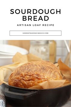 sourdough bread in a cast iron skillet with the title overlay reads sourdough bread artisan loaf recipe