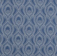 a blue and white fabric with an intricate design on it's back side,