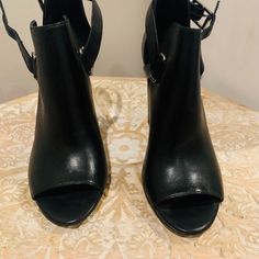 Ralph Lauren Black Leather Booties Size 8.5 New Without Box. High Heel But Very Comfortable. Already Have Several Pairs In Different Colors. Going To Let This Pair Go. Open To Reasonable Offers. Leather Booties With Ankle Strap And Reinforced Heel, Leather Booties With Reinforced Heel And Ankle Strap, Leather High Heel Booties With Stacked Heel, Chic Ankle Boot Heels With Removable Insole, Ralph Lauren Round Toe Heels For Party, Ralph Lauren High Heels For Party, Synthetic Ankle Boots With Stacked Heel, Chic Ankle-high Heels With Removable Insole, Ralph Lauren High Heel Spring Heels