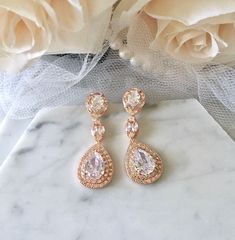 Wedding Jewelry - Cubic Zirconia Bridal Earrings - Available in Silver Rose Gold Diamond Crystal Earrings For Wedding, Pink Diamond Earrings With Diamond Accents For Wedding, Rose Gold Cubic Zirconia Diamond Earrings For Wedding, Pink Diamond Earrings With Accents For Wedding, Glamorous Rose Gold Cubic Zirconia Bridal Earrings, Glamorous Rose Gold Cubic Zirconia Chandelier Earrings, Rose Gold Diamond Bridal Earrings For Wedding, Rose Gold Cubic Zirconia Earrings With Elegant Design, Dazzling Rose Gold Cubic Zirconia Bridal Earrings