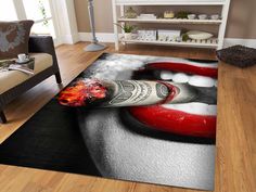 a living room area rug with a painting on the floor and a bottle of vodka