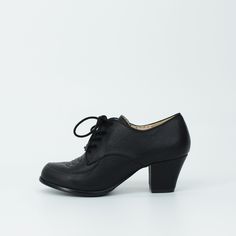 A lace-up oxford heel with a touch of embroidery on the toe, Racer is sure to win first place in your heart. This versatile heel is full of scholarly sophistication and workplace polish, perfect for pencil skirts or trousers paired with your favorite blazer. Proud To Be 100 % Vegan Friendly. Upper Material: Faux Smooth Textured Leather / Fabric Binding Lining Material: Man Made Material + Fabric Counter Lining Sock: Fully Padded With Memory Foam For Maximum Comfort. Heel Height: 2 3/8" Inches Ap Oxford Heels, Black 7, Leather Fabric, Vegan Friendly, Womens Oxfords, Black And Tan, Memory Foam, Oxford Shoes, Pencil Skirt