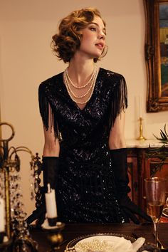 This sumptuous piece of jewelry features a retro-elegant yet slightly modern style that complements the lavish garments, reminiscent of the roaring 1920s. Features: Lustrous imitation pearls Minimalist design 69 inch / 175cm long Pearl size: 8mm in diameter Elegant V-neck Flapper Dress For Party, Glamorous V-neck Flapper Dress For Evening, Glamorous Flapper Dress For Formal Party Season, Glamorous Formal Flapper Dress For Party Season, Elegant Evening Flapper Dress, Vintage V-neck Flapper Dress For Evening, Elegant Flapper Dress For Formal Party Season, Evening Gatsby Style V-neck Flapper Dress, Elegant V-neck Flapper Dress For Night Out