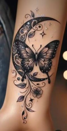 a woman's leg with a butterfly tattoo on it