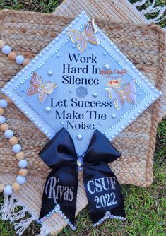 a graduation cap with the words work hard in science and let success make the noise