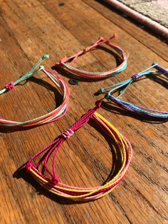 These bracelets are called wax string bracelets. These bracelets are perfect for the summer and they are adjustable meaning they can fit and wrist size! We have plenty of colors you can chose from. If you have any question message me. Summer Waxing, String Bracelets, Bracelets Patterns, Beach Bracelets, Fun Easy Crafts, Bracelet Ideas