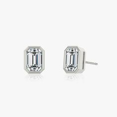 The Bezel Solitaire Studs combine vintage-inspired detail and modern appeal together for a look that’s timelessly elegant. Elegant Octagon Earrings For Formal Occasions, Classic Diamond Earrings With Polished Finish For Formal Events, Classic Diamond Earrings With Polished Finish For Formal Occasions, Classic Formal Diamond Earrings With Polished Finish, Classic Sterling Silver Earrings With Timeless Design, Timeless White Gold Baguette Cut Diamond Earrings, Classic White Gold Earrings With Timeless Design, Timeless Formal Diamond Earrings, Classic White Gold Earrings