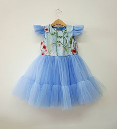 Perfect pale blue tulle dress for toddlers for celebrating wedding, first birthday and many other events. --- -Description- Material - soft dusty blue tulle Sleeve - short butterfly sleeves Lining - soft 100% cotton lining Length - knee length --- Sizes available: 6-9 months 9-12 months 12-18 months 1T 2T 3T 4T 5T Please, feel free to contact me if you have any questions. First Birthday Girl Dress, Toddler Pageant Dress, Tulle Baby Dress, 1st Birthday Girl Dress, Blue Baby Dress, Toddler Pageant Dresses, Toddler Pageant, Blue Tulle Dress