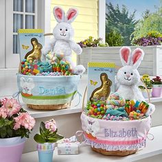 two baskets filled with easter eggs and stuffed animals