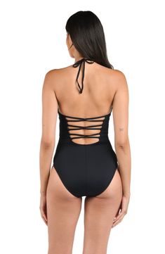 Recline in this lingerie one-piece swimsuit by La Blanca. The dainty lingerie cut adds a subtle feminine touch, while the low scoop and open strappy back offer a flirty peek to your figure. Adjustable ties, removable cups, and underwire provide personal fit. Built in tummy control tucks you in, in all the right places. Moderate rear coverage. [split] Details V-neck one piece Adjustable halter Lace-up scoop back Removable cups Underwire Tummy Control Moderate coverage Fabric 83% Nylon, 17% Elasta Low Back Bodysuit With Built-in Bra For Pool, Backless Tankini With Built-in Bra For Sunbathing, Stretch Swimwear With Crisscross Spaghetti Straps, Beach Bodysuit With Low Back And Lined Body, Black Low Back Swimwear With Lined Body, Black Low Back Lined Swimwear, Low Back Swimwear With Crisscross Straps, Backless Bodysuit With Lined Body For Pool, Stretch Swimwear With Crisscross Straps And Low Back