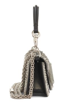 Starkly contrasting crystals and beads bring glam appeal to this leather shoulder bag that showcases a '90s-inspired silhouette and iconic VLOGO hardware. 6"W x 4"H x 2"D(interior capacity extra-small.) 5"strap drop; 23"crossbody strap drop 1.48lb Magnetic-snap flap closure Removable top carry handle; removable pull-through chain strap Interior wall pocket Structured silhouette with level base for stability Suede lining Leather Made in Italy Designer Handbags 90s Inspired, Interior Wall, Wall Pockets, Crossbody Strap, Chain Strap, Valentino Garavani, Crystal Beads, Leather Shoulder Bag, Polka Dots