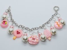 This bracelet is so stinking adorable! Made with faux pearl resin charms, and silver tone materials. Can be made longer if needed. Be sure to check out my other items too.  I have amazing deals in my CLEARANCE sections. Check them out! Pink Sweets, Pearl Resin, Fun Jewelry, Food Jewelry, Resin Charms, Pretty Pink, Jewelry Party, Charm Bracelets, Amazing Jewelry