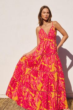 So perfect in print, this colorful maxi is featured in billowy silhouette with lace trims adjustable shoulder strap  lace trims Flowy Tiered Maxi Dress For Beach Season, Vacation Maxi Dress For Garden Party, Vacation Garden Party Maxi Dress, Pink Vibrant Print Dress For Beach Cover-up, Pink Bohemian Sundress With Spaghetti Straps, Bohemian Pink Sundress With Spaghetti Straps, Tropical Maxi Dress With Vibrant Print For Garden Party, Bohemian Tiered Sundress For Beach Season, Tropical Maxi Sundress For Garden Party