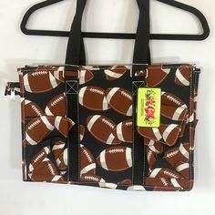 Quantity 2 For $35.00, New In Bags Football Themed Tote/Shopping/Travel/Storage/Craft Bags, Size: 15.5x10.5x6, Color: Brown Black, Top Zipper Closure, Handle Drop 10 Inches, Side Mesh Pockets, One Side 2 Slip Pockets, Other Side Has 1 Slip Pocket & 1 Velcro Flap Closure Pocket, Wipe Clean Interior, Brand New Condition Brown Satchel Diaper Bag With Large Capacity, Large Capacity Brown Satchel Diaper Bag, Brown Bags With Cell Phone Pocket For School, Black Bag With Cell Phone Pocket For Shopping, Black Shopping Bag With Cell Phone Pocket, Brown School Bags With Cell Phone Pocket, Brown Tote Diaper Bag For Daily Use, Brown Rectangular Diaper Bag With Removable Pouch, Brown Tote Diaper Bag With Removable Pouch