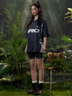 The Moss Jersey features a paneled mesh fabric construction with raglan-style sleeves. GRKC team logo patch to the chest, alongside graphic prints to the front and back. Finished off with signature GRKC garment labels. Mesh Jersey GRKC Logo Patch Graphic Print Slightly Oversized Unisex Model Bo is 186cm / 6'1" tall and wearing size XL Model Kami is 168cm / 5'6" tall and wearing size M *Please allow 1-2 weeks for processing and shipment. Athleisure Letter Print Tops For Outdoor, Outdoor Sportswear Tops With Letter Print, Sporty Oversized Top For Outdoor, Green Urban Outdoor Tops, Sporty Tops With Logo Print For Outdoor, Sporty Outdoor Tops With Screen Print, Sportswear Graphic Print Tops For Outdoor, Sporty Black T-shirt With Contrast Panels, Sportswear Tops With Graphic Print