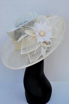 Kentucky Derby Hat, Tea Party Hat & Church Hat! Make your statement with this stunner! *100% Brand new, hand made and high quality. *Head circumference is adjustable *Material: Polyester *Crown height: 4" *Brim length 5.5" *Beautiful detail *Available in different colors Formal Hat, Classy Hats, Sinamay Hat, Hat Cream, Derby Hats Fascinators, High Tea Party, Sinamay Hats, Hat Wedding, Church Hat