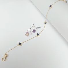 ✨ BRACELET 14K Gold Navy Blue Star Bracelet, Bracelets for Women, Celestial Star Gift, ✨ Details : There are 5 stars on the bracelet. star dimensions 5X5 mm / 0.2X0.2 Inch * Gold KT: 14K Solid Gold * Bracelet lengths:5.5",5.75", 6",6.5", 7'', 7.5", 8'' ✨ SHIPPING All the orders will be shipped to the shipping address supplied through your Etsy Order. Please check this address is correct before finishing your check out. Artgenie Jewelry is not responsible for packages shipped to wrong addresses. Blue Star Charm Bracelet, Elegant Blue Jewelry With Star Charm, Elegant Blue Star Charm Jewelry, Dainty Blue Jewelry With Star Charm, Blue Star Charm Jewelry, Blue Bracelet With Star Charm As Gift, Blue Bracelets With Star Charm For Gift, Elegant Blue Star-shaped Jewelry, Bracelet Star