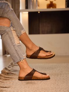 Step into style with our Maibulun T-Strap Footbed Thong! Featuring a comfortable footbed and a resistant to dirt dark brown, these sandals will keep your feet happy and your outfit on point. Perfect for any occasion, these sandals are a must-have for any fashion-forward individual or outer door activities. Slip-on Hard Cushioned footbed Man-made leather upper Man-made lining EVA sole Casual Brown T-strap Sandals With Textured Footbed, Casual Brown T-strap Sandals With Cushioned Footbed, Brown T-strap Sandals For The Beach, Brown T-strap Sandals With Textured Footbed For Beach, Brown Open Toe T-strap Sandals With Leather Footbed, Reindeer Headband, Footbed Sandals, Eva Sole, Brown Sandals