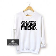 Buy our popular Check On Your Strong Friend sweatshirt at Tees Of Life. This fun, black, white, red, gray or gold sweatshirt is available in all sizes. Shop statement sweatshirts! Woman-owned business! Friends Sweatshirt, Black White Red, Black White, Sweatshirts, Grey, Red, Black