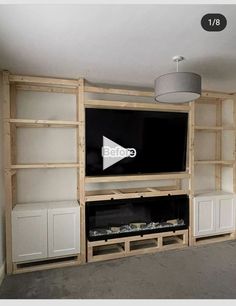 the entertainment center is built into the wall