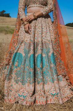 Beige Lengha w/ Resham, Pearl & Sequins: Modern Indian Dresses in USA – B Anu Designs #lehengacholi #bridallehenga #heavylehenga #trendylehenga Wedding Saree Embroidered Fabric With Meenakari, Wedding Meenakari Embroidered Traditional Drape Fabric, Wedding Embroidered Fabric With Meenakari In Traditional Drape, Multicolor Embroidered Gown With Dupatta For Wedding, Wedding Gown With Multicolor Embroidery And Zari Work, Wedding Gown With Multicolor Embroidery And Dupatta, Anarkali Wedding Choli With Meenakari, Wedding Saree With Multicolor Meenakari Embroidery, Multicolor Embroidered Lehenga For Traditional Ceremonies