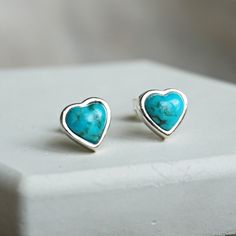 "Top your style with these dainty turquoise hearts. Post earrings. Solid 925 sterling silver Genuine turquoise 100% handcrafted Size: 8 x 8mm * By Sowell Jewelry. Stamped with \"925\" and \"SJ\" Official site: www.sowelljewelry.com SUBSTANTIAL PACKAGING: To ensure our packaging is as eco-friendly as possible, we only use recyclable materials such as paper and cardboard." Hypoallergenic Turquoise Jewelry For Anniversary, Silver Heart Earrings With Gemstones, Silver Gemstone Heart Earrings, Turquoise Heart-shaped Sterling Silver Earrings, Turquoise Sterling Silver Earrings For Anniversary, Handmade Turquoise Jewelry For Valentine's Day, Blue Sterling Silver Nickel-free Heart Earrings, Blue Nickel-free Sterling Silver Heart Earrings, Dainty Turquoise Earrings For Gift