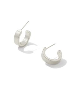 Your favorite huggie style goes bold in the Henry Huggie Earrings in Silver. The perfect base for an on-trend earring stack, this pair easily dresses up (or down!) to match your day-to-day look. Versatile and lightweight, these huggies will be your new style staple. Metal Rhodium Over Brass Closure Ear Post Size 0.67"L X 0.2"W Earring Stack, Huggie Earrings, Huggies Earrings, New Style, Brass, Silver, Dresses