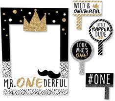 a black and gold photo frame with some stickers around it that says,'mr onederful '