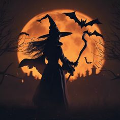 a woman dressed as a witch holding a broom in front of a full moon with bats