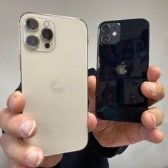 two people holding up their new iphones in front of the camera lens and phone case