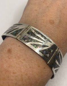 Vintage Abalone 925 Sterling Silver Bracelet https://www.etsy.com/listing/1188539328/vintage-abalone-925-sterling-silver?utm_source=crowdfire&utm_medium=api&utm_campaign=api Silver Inlay Cuff Bracelet Bangle, Silver Bracelet With Inlay For Collectors, Unique Silver Bracelets With Inlay, Formal Silver Bracelets With Inlay, Adjustable Silver Bangle With Inlay, Boho Trends, Vintage Jewelry Sets, Wide Bracelet, Heart Shaped Rings