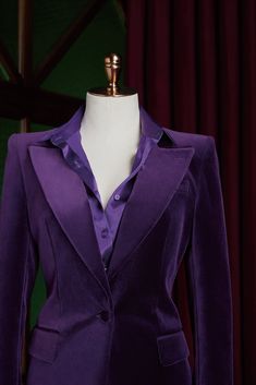 This premium purple, velvet suit is perfect for formal events and everyday wear. It features a customized design, a flattering flared trouser style, and a sleek, modern look with no belt loops. Make a statement and stand out with this versatile addition to your wardrobe. Elegant Purple Suit With Suit Collar, Velvet Notch Lapel Suit For Evening, Tailored Velvet Evening Suits, Fitted Purple Formal Suit, Purple Single Breasted Suit For Formal Occasions, Fitted Purple Suit For Formal Occasions, Chic Purple Formal Blazer, Elegant Single Breasted Velvet Suit, Elegant Purple Business Blazer