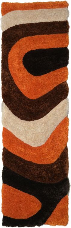 an orange, brown and white rug with wavy lines on the bottom half of it