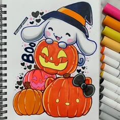 a notebook with an image of a dog and pumpkins