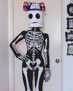 a skeleton is standing in front of a door with a beer can on it's head