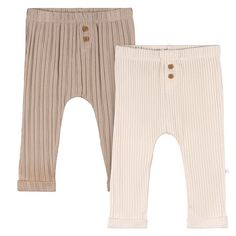 two pairs of baby pants with buttons on the bottom, one in beige and one in white