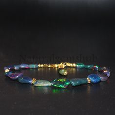 Black Opal Jewelry Opal Auctions, Adjustable Opal Gemstone Bracelet, Adjustable Opal Gemstone Bracelets, Opal Gemstone Beads Bracelets, Opal Gemstone Bracelets, Opal Beaded Bracelets For Gifts, Spiritual Hand-strung Opal Jewelry, Beaded Opal Bracelets, Funky Accessories