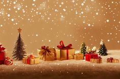 christmas presents are lined up in front of a snow covered background with trees and lights