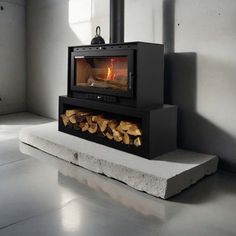 an open fire place with logs in it