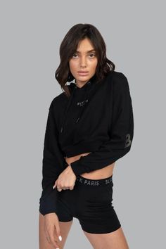 Black Cropped Hoodie For Streetwear, Black Cropped Hoodie With Drawstring Hood, Black Sporty Cropped Hoodie, Casual Black Cropped Hoodie, Sporty Black Cropped Sweatshirt, Black Cropped Sweatshirt For Streetwear, Black Cropped Sporty Sweatshirt, Fitted Hoodie For Streetwear, Cropped Athleisure Sweatshirt For Streetwear