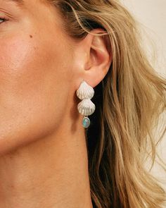 Showstopping sterling silver aquamarine shell earrings. These statement earrings will have everyone complimenting your unique style! They are perfect for the boho beach lover looking to embrace mermaid vibes or for the girl who loves unique jewelery that speaks volumes! Aquamarine can represent hope, happiness and emotions. It also connects us to the wisdom of water and the moon.Material: Genuine Sterling Silver 92.5Gemstone: AquamarineGemstone size: 8mmLength/wide: 40mmCondition: Brand new Ocean-inspired Turquoise Shell Jewelry, Bohemian Summer Jewelry In Ocean Color, Summer Bohemian Blue Jewelry, Summer Bohemian Ocean Color Jewelry, Summer Bohemian Style Blue Jewelry, Ocean-inspired Sterling Silver Beach Jewelry, Shell-shaped Sterling Silver Jewelry For Beach, Silver Shell-shaped Earrings For Summer, Silver Shell Drop Earrings