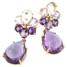 Amethyst symbolizes the purity of the soul and humility, with its intense purple color protects against negative thoughts and keeps depression away. Made in Italy by Stanoppi Jewellery since 1948. Earrings in 18k rose gold with Amethyst (drop cabochon cut, size: 12x18mm; drop cut, size: 7x10, 5x7mm; round cut, size: 5,00mm) and Prasiolite (drop cut, size: 7x10 mm) g.15,50 All Stanoppi Jewelry is new and has never been previously owned or worn. Each item will arrive at your door beautifully gift Elegant Pouch, Jewel Box, Bead Jewellery, Negative Thoughts, 18k Rose Gold, The Soul, Jewelry Earrings Studs, Purple Color, Or Rose