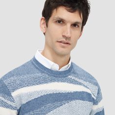 This luxe wool-cotton sweater blends style with comfort. Its mixed stitch creates depth with a captivating ripple pattern. Ideal for all seasons, it offers wool's warmth and breathability with cotton's softness and durability. Ribbed crew neck, cuffs, and hem ensure a snug fit, perfect for casual or refined looks. Casual Blue Merino Wool Sweater, Casual Merino Wool Jacquard Knit Sweater, Blue Textured Knit Wool Sweater, Ripple Pattern, Blazer And T Shirt, Vest Blazer, Vacation Resorts, Fashion Socks, Equatorial Guinea