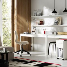 a white desk and chair in a room