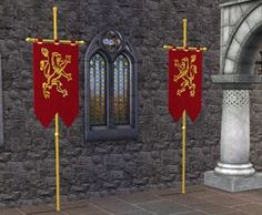 two red and yellow flags are in front of a stone building