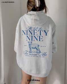 This Unisex hooded sweatshirt features "He left the ninety-nine to rescue me | and He'll do the same for you | Matt. 18:10-14" with a cute vintage lamb illustration on the back and front pocket side. Spread God's love and the gospel with this coquette-style Christian sweater <3 Make sure to check out the other garment options below :) » O P T I O N S « ‣ Tshirt: https://www.etsy.com/listing/1716679452 ‣ Crewneck: https://www.etsy.com/listing/1672124614 » A B O U T « ‣ This item is made to order using direct-to-garment (DTG) printing technology. This digital process involves the printer inks being jetted or sprayed onto the textile by a print head after the garment goes through a pre-treatment machine to create a stronger bond between garment fibers and the pigmented inks. ‣ This is NOT scr Christian Hoodies Aesthetic, He Left The 99 To Find Me, Christian Sweatshirt Designs, Lamb Illustration, Christian Sweater, Jesus Hoodies, Christian Outfits, Vintage Lamb, Blue Coquette