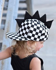 Check out our checkered hat that has some fashion spikes on top! These spikes are soft and can't poke or hurt! Don't forget to straighten spikes when opening package and putting on your Kids head We have 2 sizes Infant/toddler 0-3 years Youth kids 3-teenage Punk Cap Hat One Size Fits Most, Casual Adjustable Hat With Structured Crown, Casual Snapback Hats For Playtime, Casual Hat With Adjustable Structured Crown, Punk Style Cap One Size Fits Most, Punk Style Cap Hat, Fun Adjustable Hat For Playtime, Playful Adjustable Hat For Play, Playful Adjustable Hats For Play