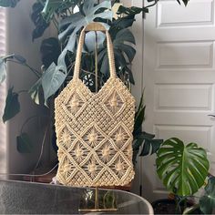 Handmade Macrame Straw Bag Beige Macrame Rectangular Shoulder Bag, Beige Macrame Tote Beach Bag, Beige Macrame Beach Tote Bag, Cream Macrame Crochet Bag For Everyday Use, Beige Rectangular Macrame Shoulder Bag, Bohemian Macrame Shoulder Bag, Cream Macrame Shoulder Bag For Daily Use, Everyday Bohemian Macrame Shoulder Bag, Rectangular Beige Macrame Shoulder Bag